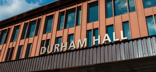 Shot of Durham Hall building and sign.
