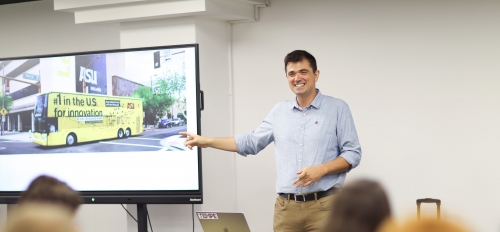 ASU Professor Visar Berisha gives a presentation to participants in a classroom.