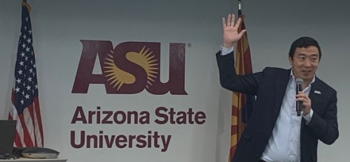 Andrew Yang speaking into a microphone at ASU event