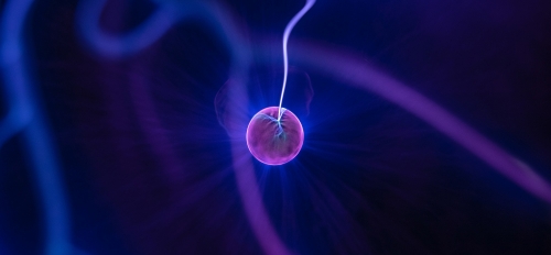 Illustration of a pink ball in blue waves of energy.