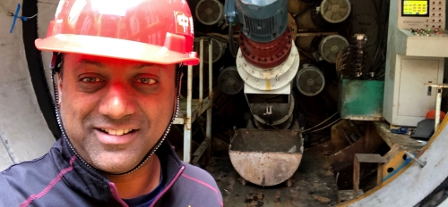 ASU Professor Samuel Ariaratnam snaps a selfie while working on pipeline construction