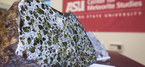 A meteorite is shown close up.