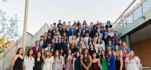 Group of Medallion Scholars posing together on a staircase outside.
