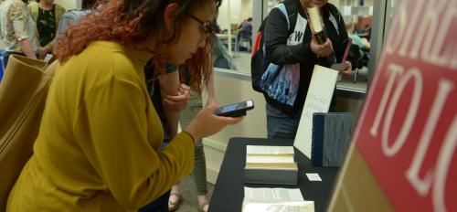Students view signed copies of Martin Luther King Jr. Strength to Love Stride Toward Freedom