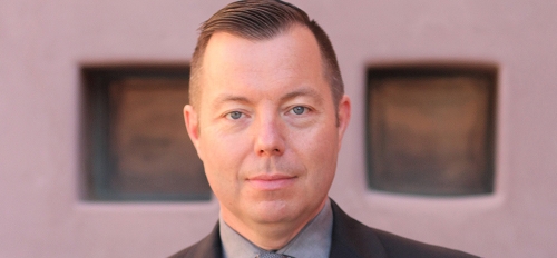 Portrait of ASU Associate Professor Jason Caslor.