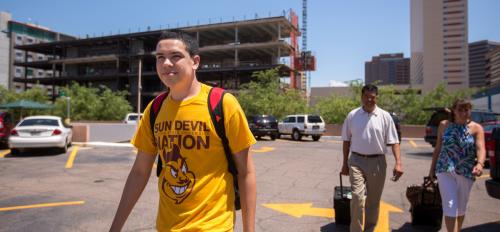 Joey Ramos-Mata walks toward his dorm.