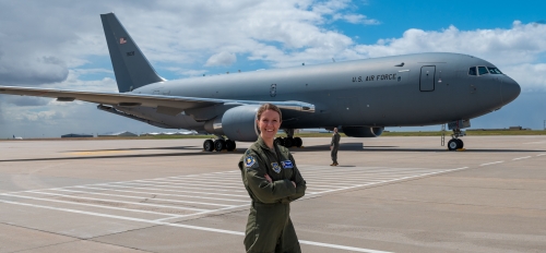 Courtesy photo of ASU graduate Kimberly Jackson in Air Force uniform with a KC-46 in the background.