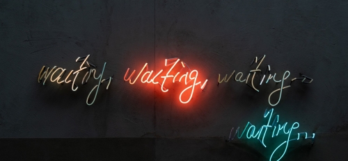 Abstract stock photo featuring the word "waiting" in various colors.
