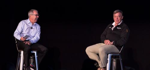 Mark King and Michael Crow speak onstage