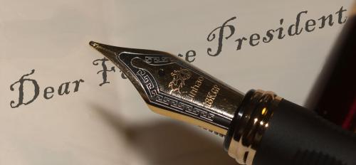 pen writing "Dear Future "President"