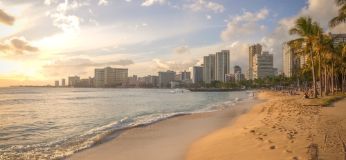 Beach in Honolulu with city line in the background