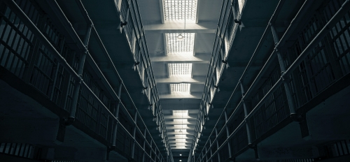 Rows of prison cells.
