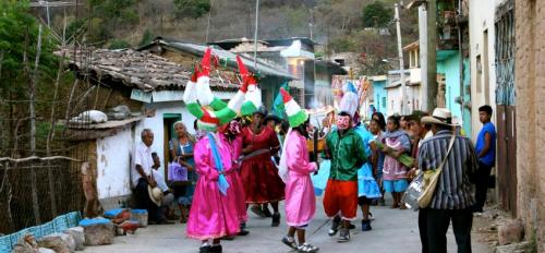 Nahua/Mexicano community dance in the streets during a celebration