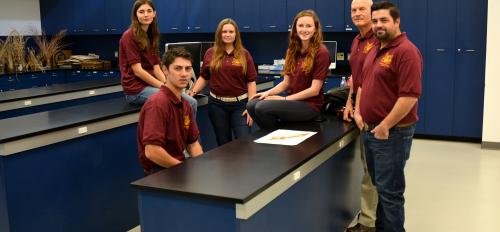 ASU's 2015 Society for Range Management competitors and faculty coach in lab
