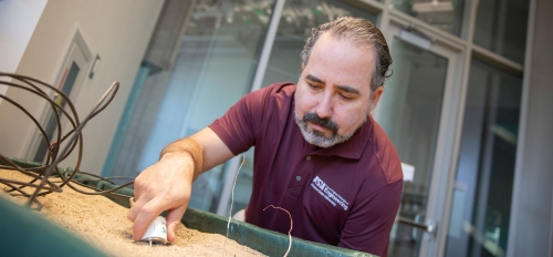 Enrique Vivoni, the Fulton Professor of Hydrosystems Engineering in the Ira A. Fulton Schools of Engineering at Arizona State University, works in the Hydrology Research Lab in the Walton Center for Planetary Health at ASU’s Tempe campus.