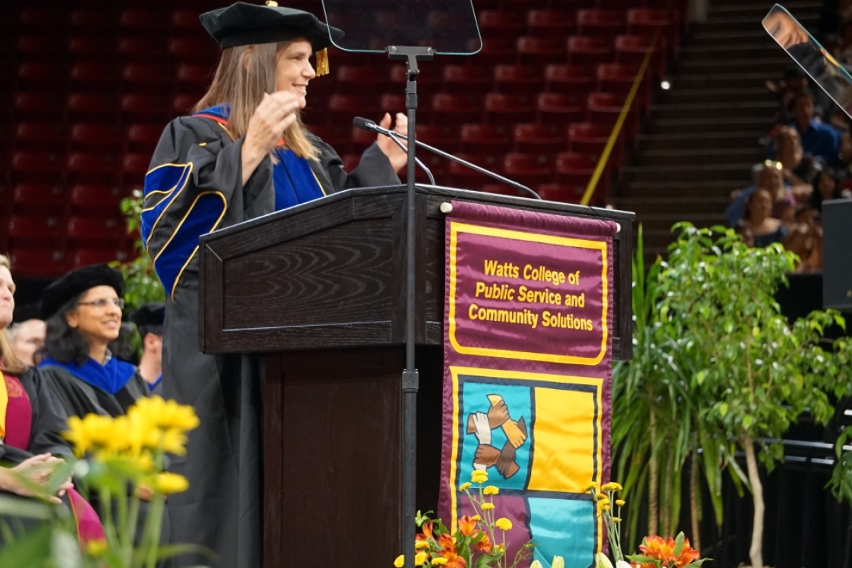 Elizabeth Lightfoot, director, ASU School of Social Work, congratulates graduates, Watts College spring 2023 convocation