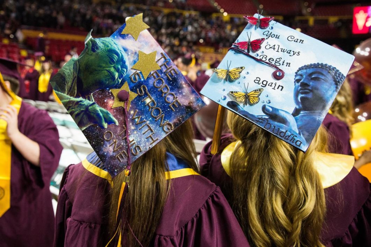 decorated mortarboards at graduation