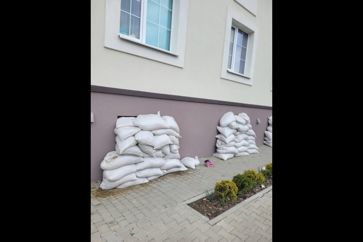 Basement windows with sandbags in Ukraine