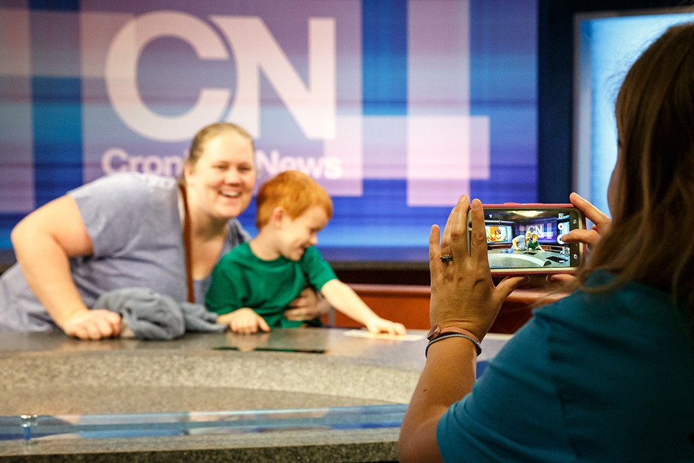 Mother and son in Cronkite Newsroom