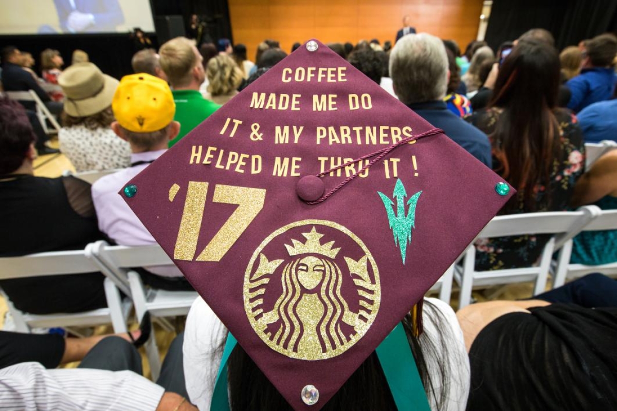 decorated mortarboard that says 