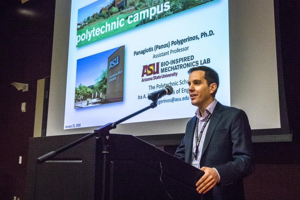 Panagiotis Polygerinos speaks at the Southwest Robotics Symposium