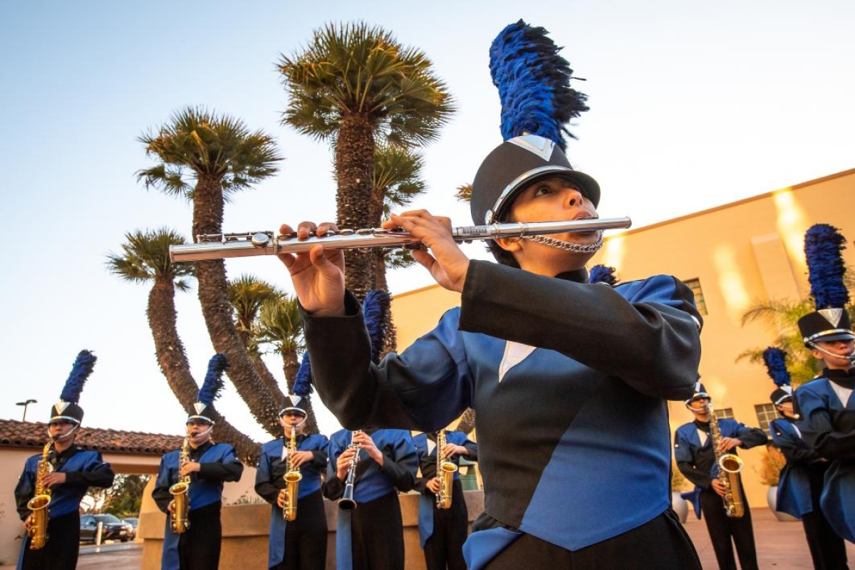 A high school marching band leads a procession at the ASU GSV Summit