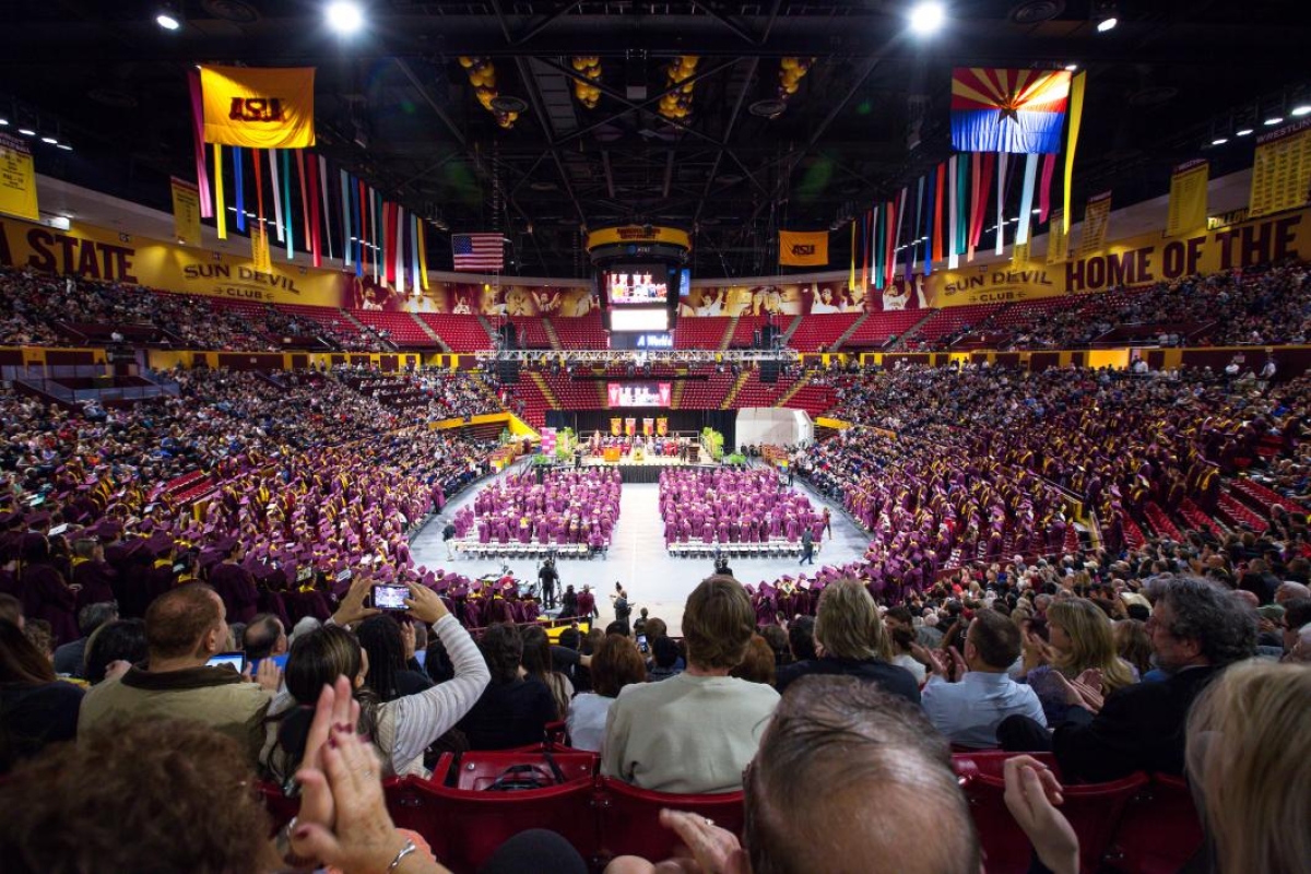 attendees of commencement in Wells Fargo Arena