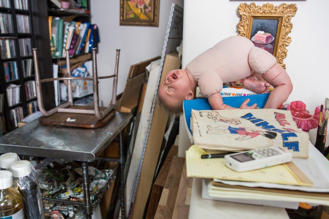 baby doll in art studio