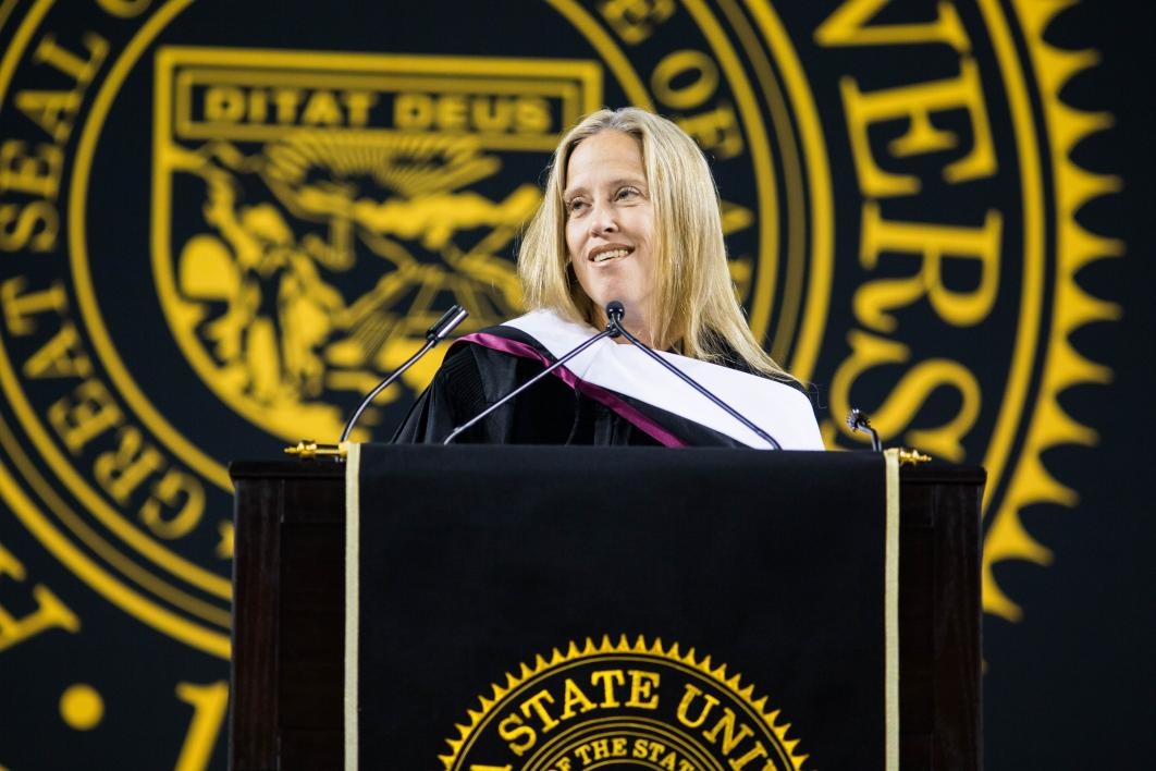 woman speaking at commencement