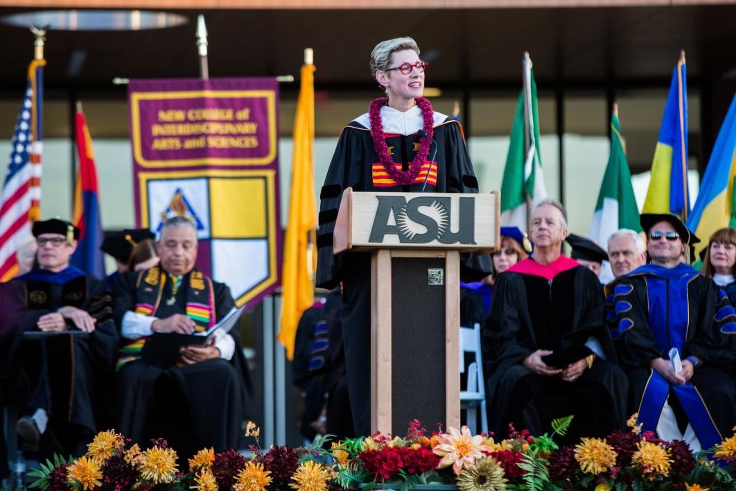 woman speaking at podium during convocation