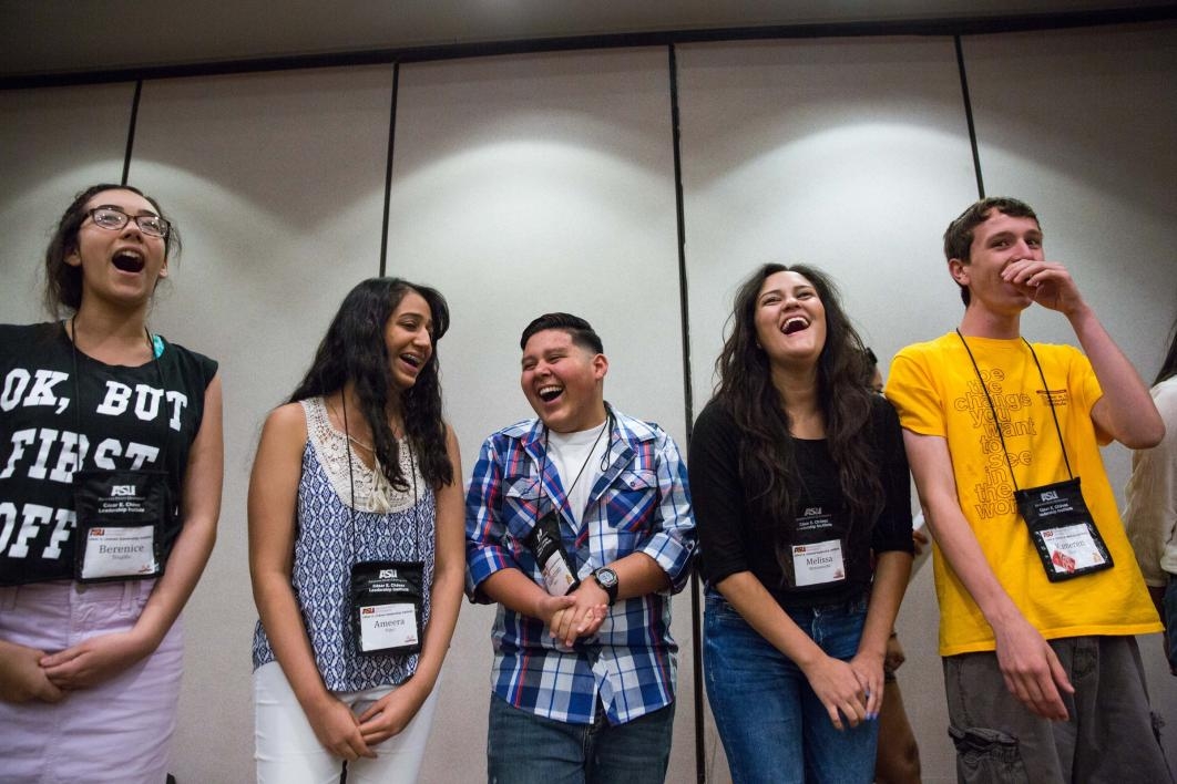 Students crack up while performing a vocal exercise at the Cesar E Chavez Leadership Institute