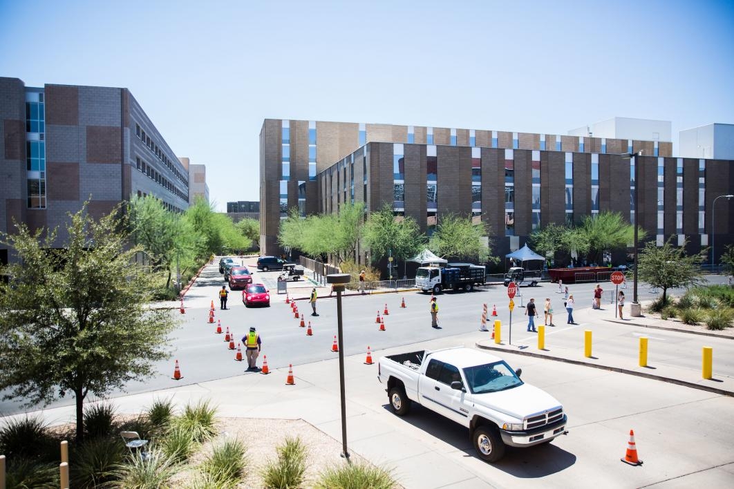 line of cars at move-in on campus