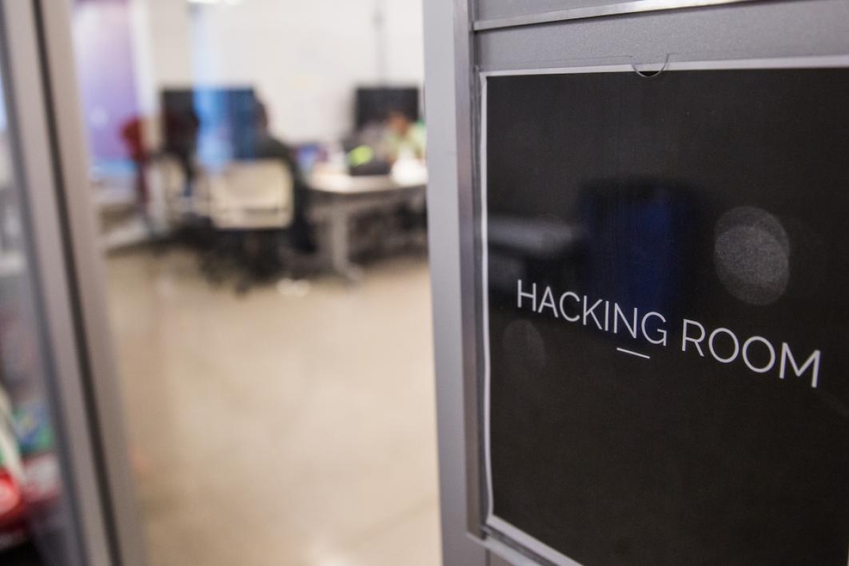 A sign on a hacking room