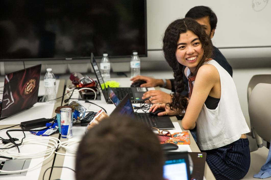A student works with her team during the hackathon