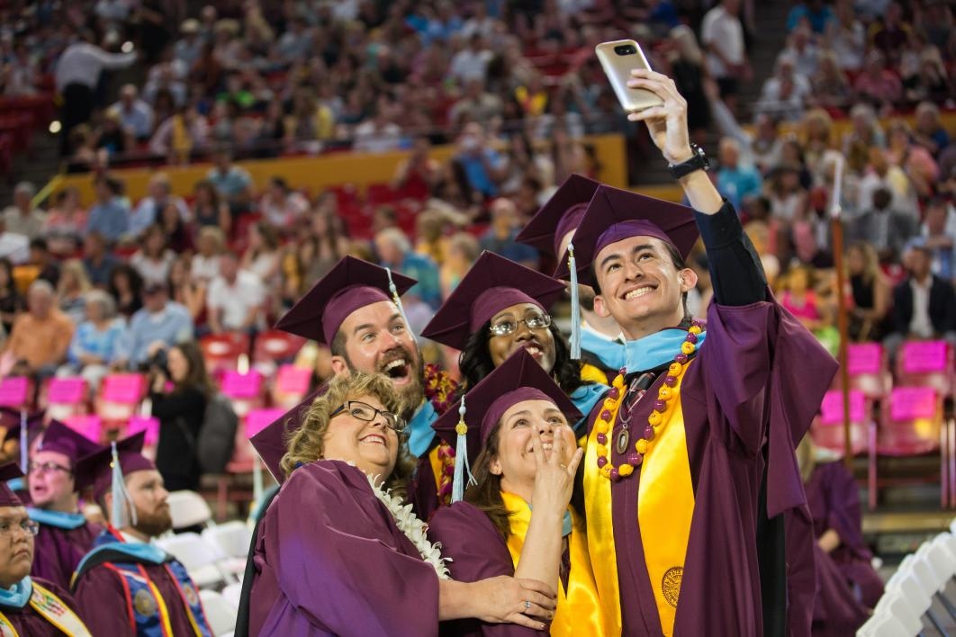 grads taking a selfie
