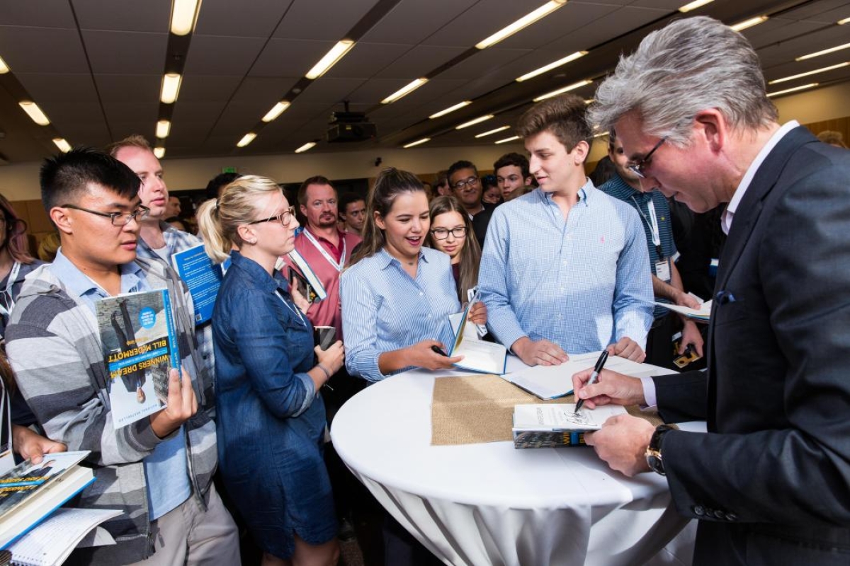People gather to get autographs from SAP CEO Bill McDermott