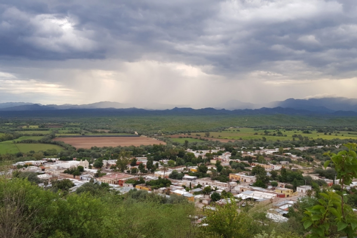 The Mexican town of Rayon with a monsoon storm in the background.