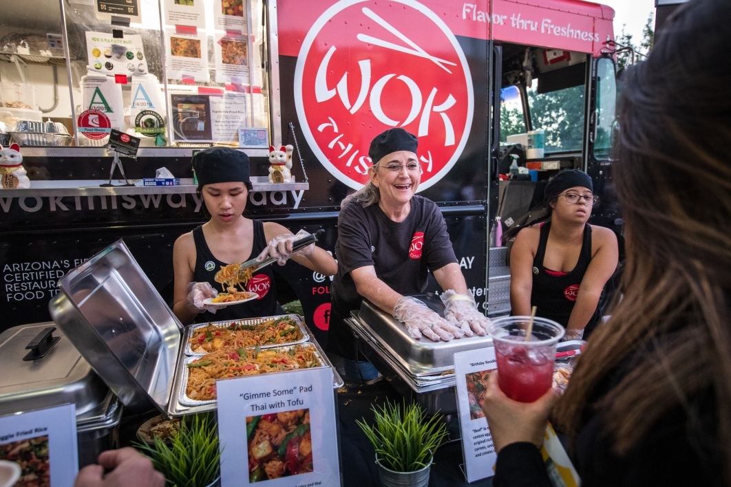 Wok This Way server Ellyn Starikoff chats with customers
