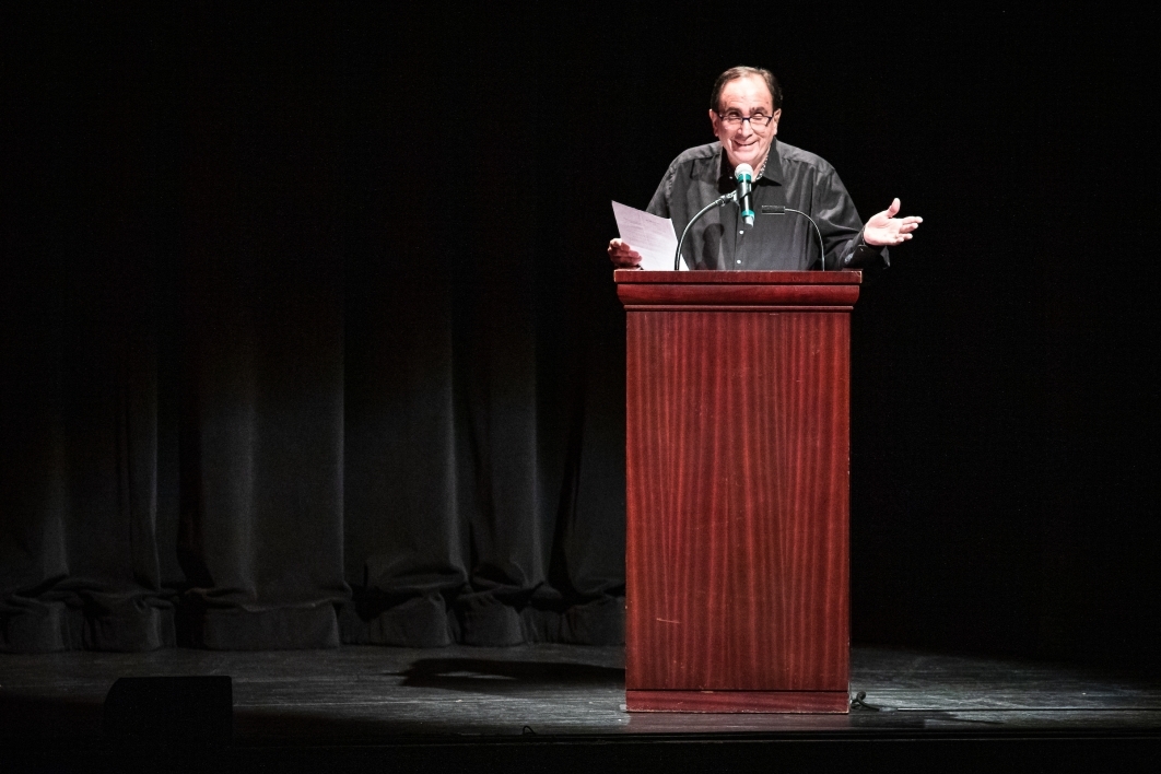 R. L. Stine speaking on stage at the Orpheum Theatre in Phoenix