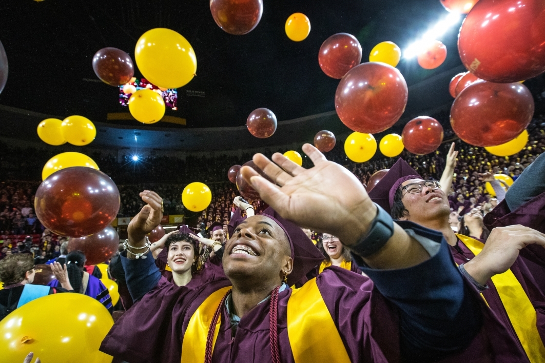 balloons dropping from ceiling at graduation