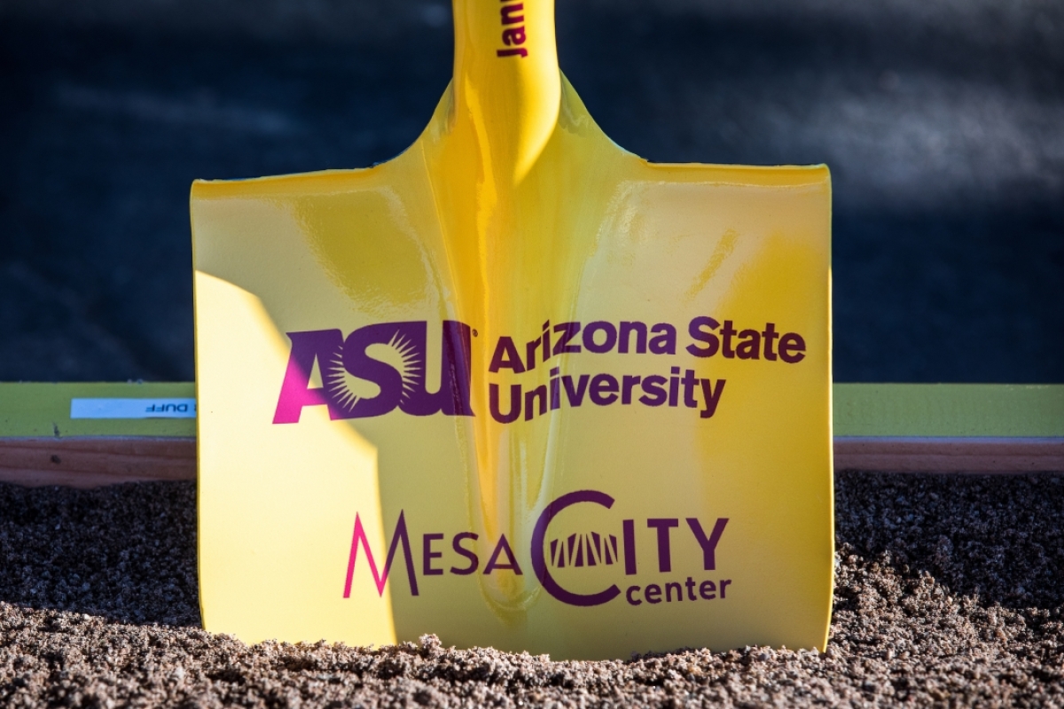 close up of gold shovel with ASU and Mesa City Center logos
