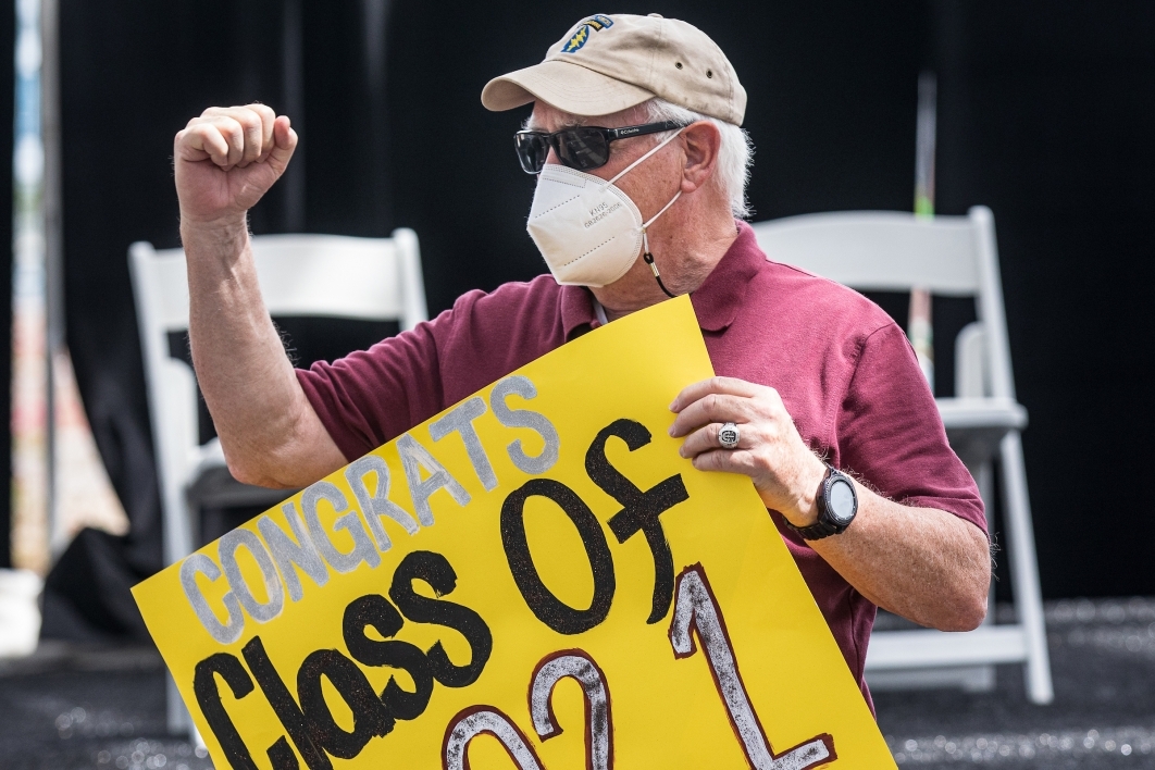 David Lucier congratulates veteran graduates