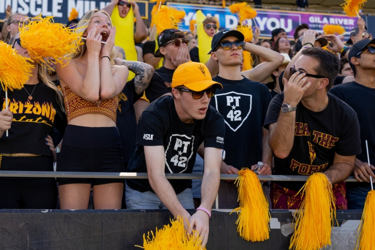 Students gasp at an ASU football game after a disappointing play