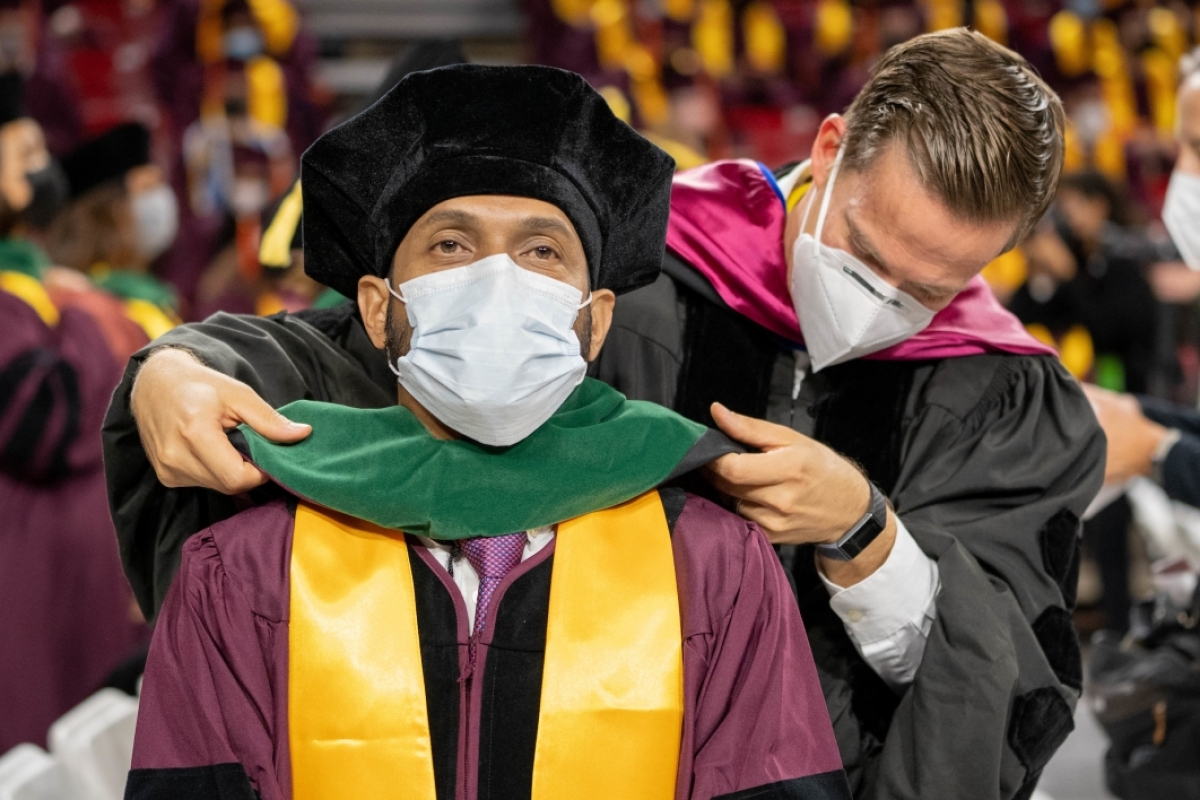 student receiving doctoral hood