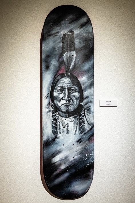Skateboard painted with an image of Sitting Bull.