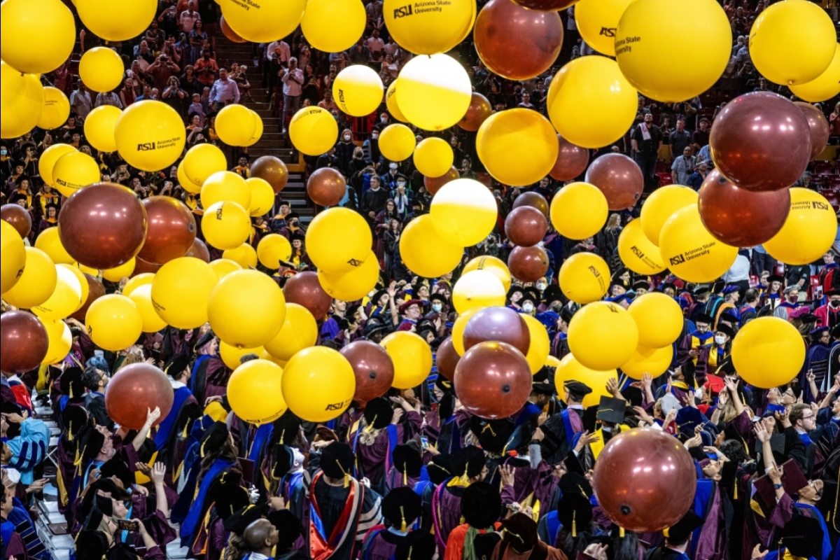 Balloons fall during Graduate Commencement