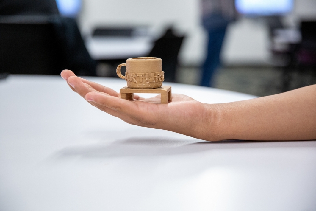 hand holding 3D-printed cup