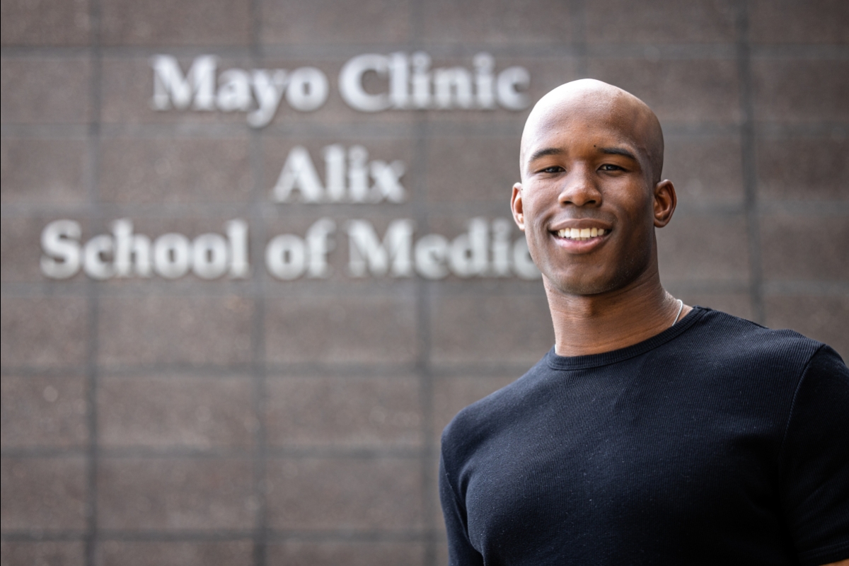 Portrait of student in front of Mayo Clinic Alix School of Medicine