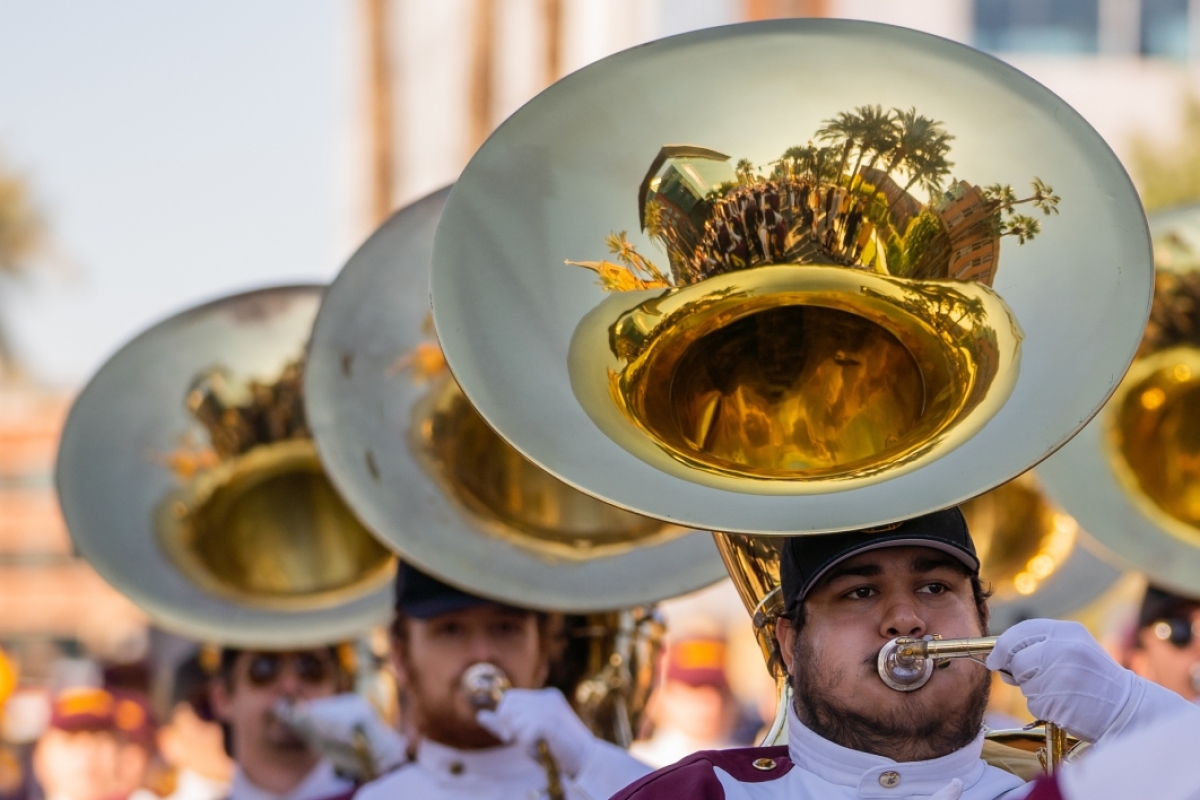 Marching band playing tubas during parade