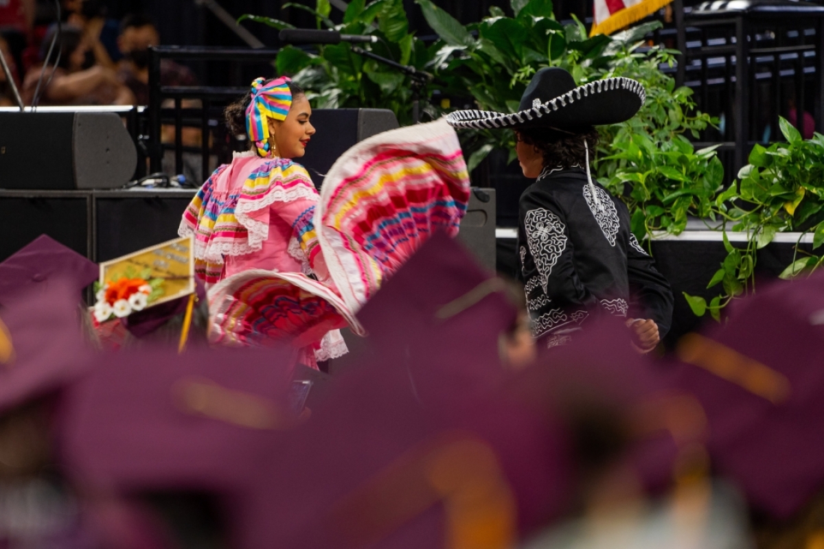 Hispanic dancers performing at graduation